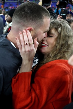 BALTIMORE, MARYLAND - JANUARY 28: Travis Kelce #87 of the Kansas City Chiefs celebrates with Taylor Swift after a 17-10 victory against the Baltimore Ravens in the AFC Championship Game at M&T Bank Stadium on January 28, 2024 in Baltimore, Maryland. (Photo by Patrick Smith/Getty Images)