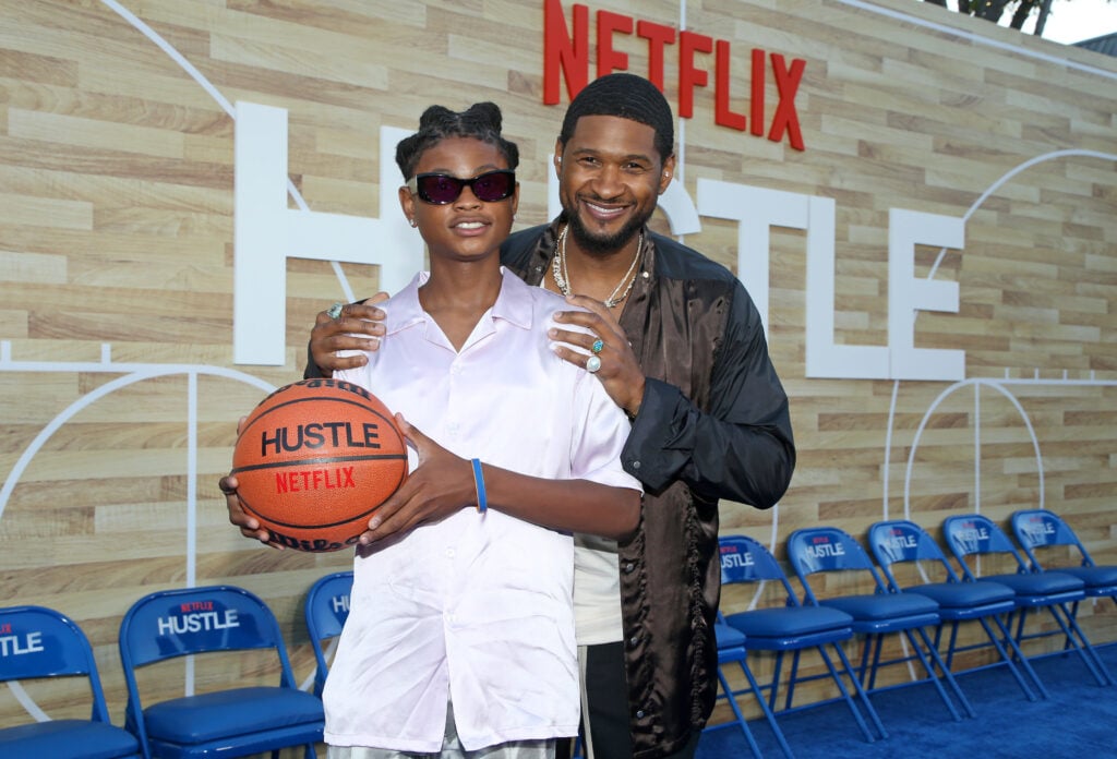 Usher poses with Usher 