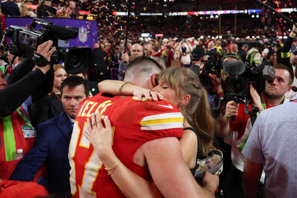 Travis Kelce and Taylor Swift embrace after his Super Bowl 2024 win.