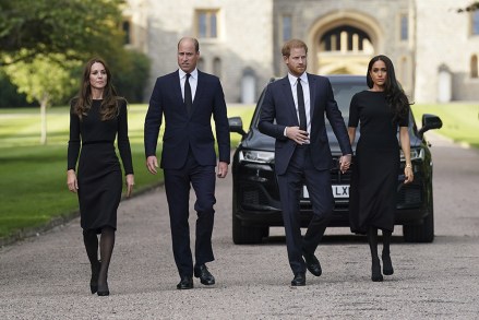 From left, Kate, the Princess of Wales, Prince William, Prince of Wales, Prince Harry and Meghan, Duchess of Sussex walk to meet members of the public at Windsor Castle, following the death of Queen Elizabeth II on Thursday, in Windsor, England
Royals, Windsor, United Kingdom - 10 Sep 2022