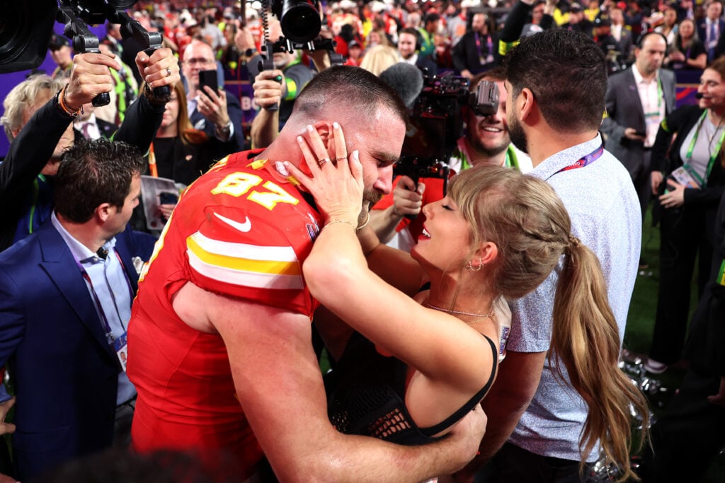 Travis Kelce #87 of the Kansas City Chiefs celebrates with Taylor Swift after defeating the San Francisco 49ers 2 during Super Bowl LVIII at Allegiant Stadium on February 11, 2024 in Las Vegas, Nevada. 