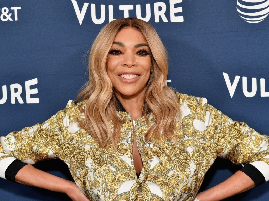 Wendy Williams in gold jacket on red carpet