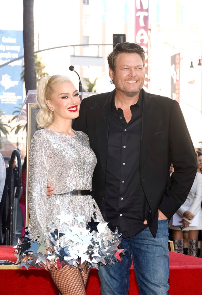 Blake Shelton as his more talented, more successful wife Gwen Stefani receives her star on the Hollywood walk of fame.