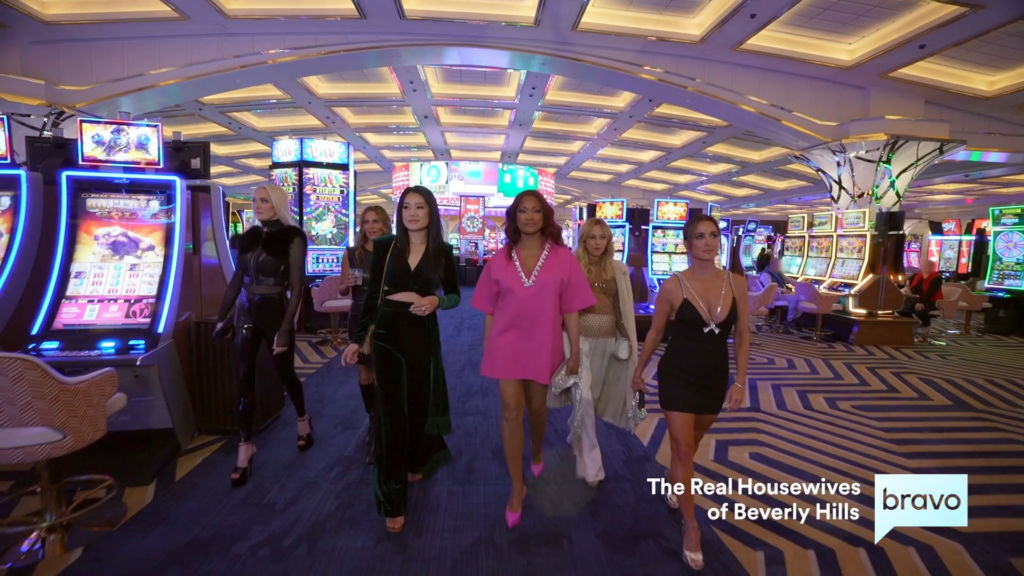 Erika Jayne, Dorit Kemsley, Crystal Kung Minkoff, Garcelle Beauvais, Sutton Stracke, and Kyle Richards are looking fantastic while walking through a hideous eyesore.