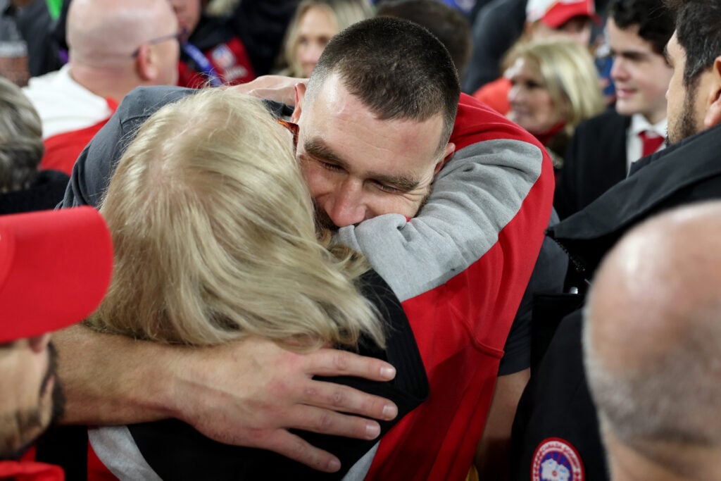 Travis Kelce embraces mother Donna Kelce ahead of the 2024 Super Bowl.