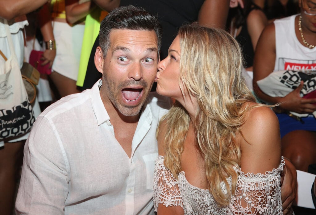 Eddie Cibrian and LeAnn Rimes attend Luli Fama fashion show during Mercedes-Benz Fashion Week Swim 2015 at Cabana Grande at The Raleigh on July 20, 2014 in Miami, Florida. 