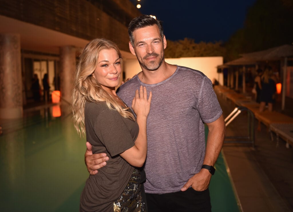 LeAnn Rimes and Eddie Cibrian attend the Maxim Magazine Worldwide Swimwear Collection launch at SLS South Beach on July 18, 2015 in Miami, Florida. 