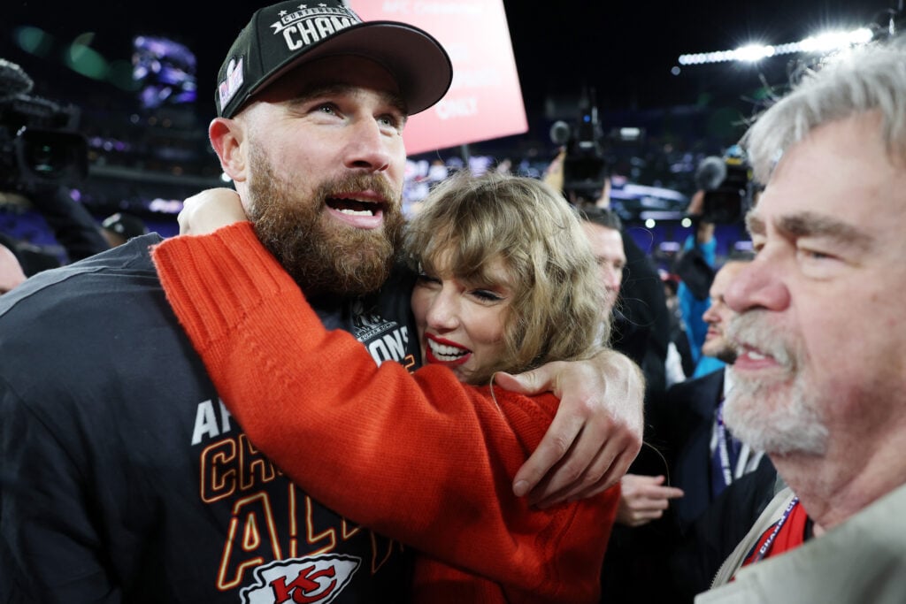 Travis Kelce #87 of the Kansas City Chiefs celebrates with Taylor Swift after a 17-10 victory against the Baltimore Ravens in the AFC Championship Game at M&T Bank Stadium on January 28, 2024 in Baltimore, Maryland. 