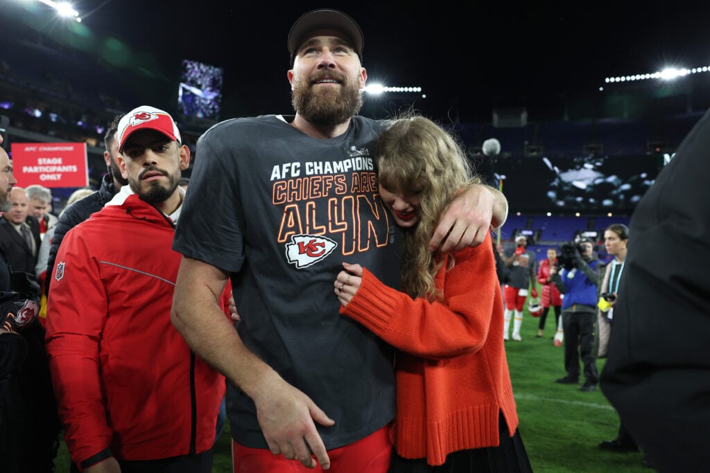 Travis Kelce #87 of the Kansas City Chiefs celebrates with Taylor Swift after a 17-10 victory against the Baltimore Ravens in the AFC Championship Game at M&T Bank Stadium on January 28, 2024 in Baltimore, Maryland.