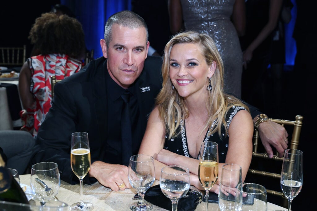 Jim Toth and Reese Witherspoon attend The 23rd Annual Critics' Choice Awards at Barker Hangar on January 11, 2018 in Santa Monica, California. 