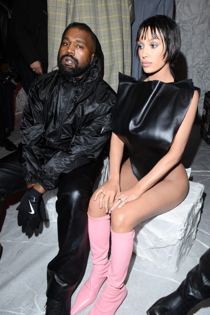 Kanye West and new wife Bianca Censori in February 2024. She looks, to some, like a depressed doll by his side.